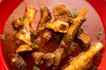 Mutton OR Gosht Masala OR indian lamb rogan josh with some seasoning, served with Naan, paratha or...
