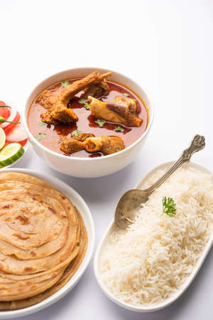 Mutton OR Gosht Masala OR indian lamb rogan josh with some seasoning, served with Naan, paratha or...