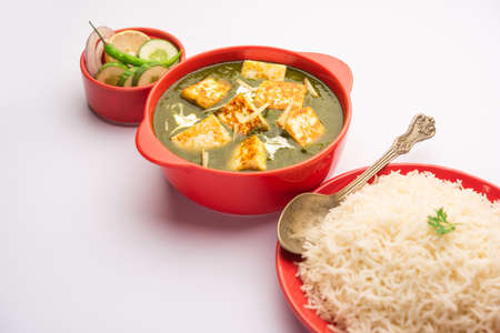 Palak paneer or Spinach and Cottage cheese curry served with rice and chapati