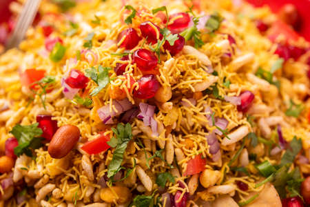 Bhelpuri or Bhel is a savoury roadside snack originating from India, and is also a type of chaatの写真素材