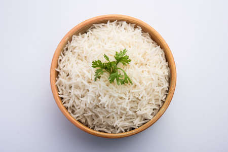Cooked plain white basmati rice or steamed rice in bowlの写真素材