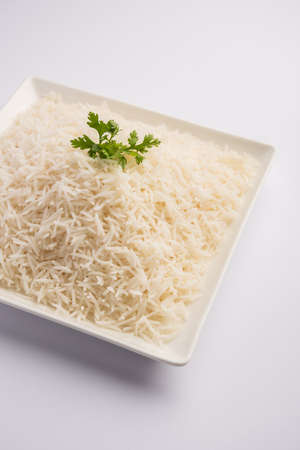 Cooked plain white basmati rice or steamed rice in bowlの写真素材