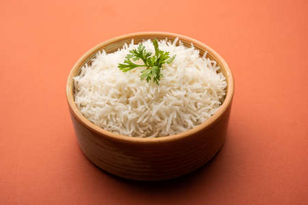 Cooked plain white basmati rice or steamed rice in bowlの写真素材