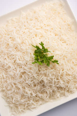 Cooked plain white basmati rice or steamed rice in bowlの写真素材