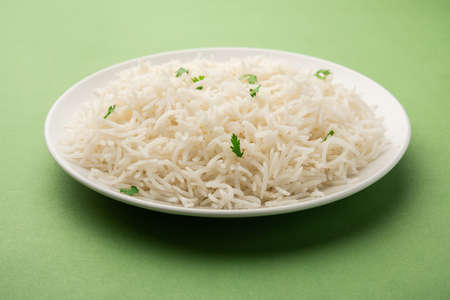 Cooked plain white basmati rice or steamed rice in bowlの写真素材