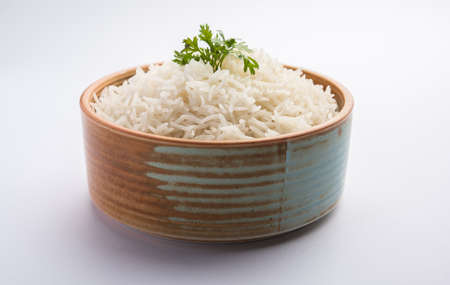 Cooked plain white basmati rice or steamed rice in bowlの写真素材