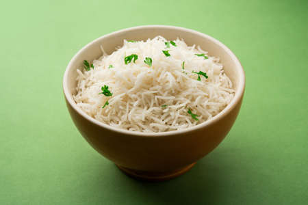 Cooked plain white basmati rice or steamed rice in bowlの写真素材