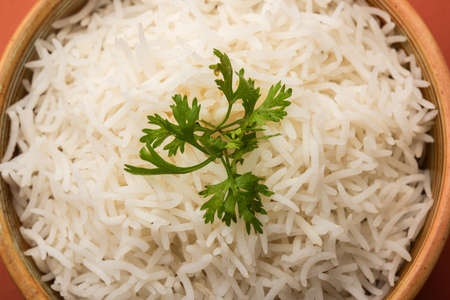 Cooked plain white basmati rice or steamed rice in bowlの写真素材