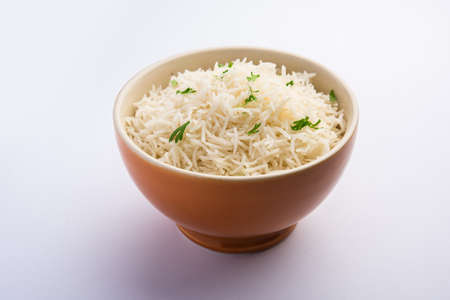 Cooked plain white basmati rice or steamed rice in bowlの写真素材