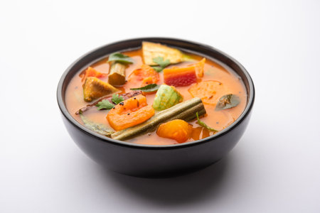 Sambar is a lentil-based vegetable stew/soup, cooked with pigeon pea and tamarind broth. It is popular in South Indian and Sri Lankan cuisines.の写真素材