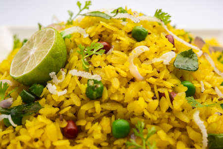 Pohe, poha or Pohaa, also known as pauwa, sira, chira, or aval, Bajil among many other names, is flattened rice originating from the Indian subcontinentの写真素材