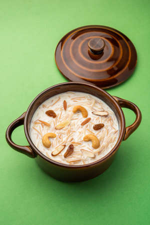 Semiya payasam or shewai or sewai Khir or seviyan Kheer is a Indian sweet made with vermicelli, milk, ghee, sugar or jaggery, raisins and nutsの写真素材