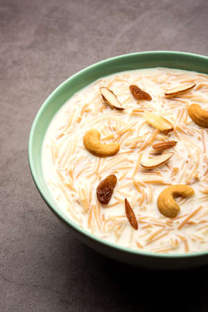 Semiya payasam or shewai or sewai Khir or seviyan Kheer is a Indian sweet made with vermicelli, milk, ghee, sugar or jaggery, raisins and nutsの写真素材