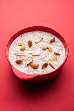 Semiya payasam or shewai or sewai Khir or seviyan Kheer is a Indian sweet made with vermicelli, milk, ghee, sugar or jaggery, raisins and nutsの写真素材