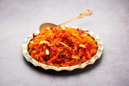 Gajar halwa, also known as gajorer halua, gajrela, gajar pak, and carrot halwa is a carrot-based sweet dessert pudding from the Indian subcontinentの写真素材