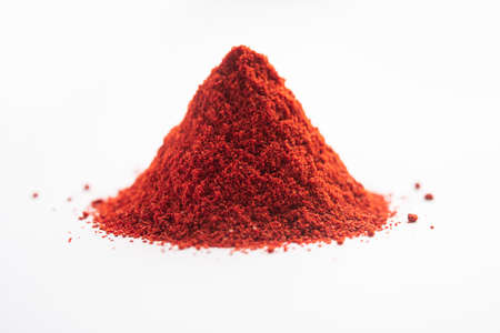 Red Chilli or Lal Mirchi or mirch with Powder in a bowl or mortar over moody background, selective focusの写真素材