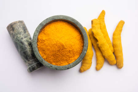 Dry Turmeric Dust or Haldi Powder also known as curcuma longa linn, selective focusの写真素材
