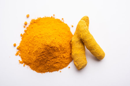 Dry Turmeric Dust or Haldi Powder also known as curcuma longa linn, selective focus