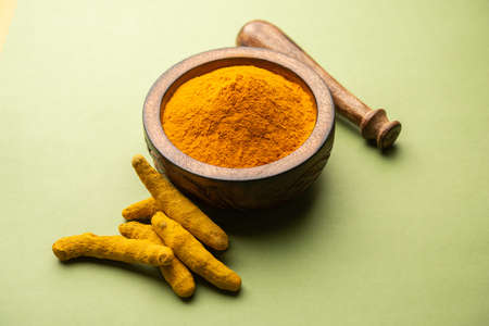 Dry Turmeric Dust or Haldi Powder also known as curcuma longa linn, selective focusの写真素材