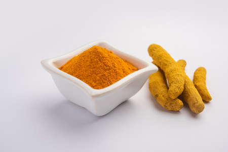 Dry Turmeric Dust or Haldi Powder also known as curcuma longa linn, selective focusの写真素材