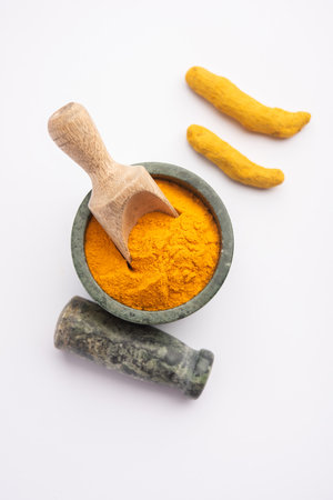 Dry Turmeric Dust or Haldi Powder also known as curcuma longa linn, selective focusの写真素材