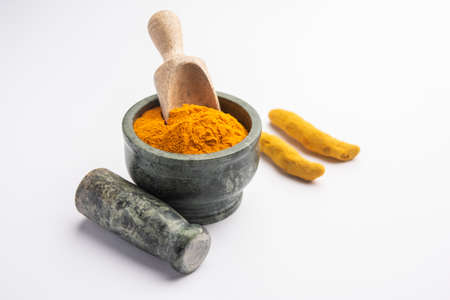 Dry Turmeric Dust or Haldi Powder also known as curcuma longa linn, selective focusの写真素材
