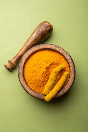 Dry Turmeric Dust or Haldi Powder also known as curcuma longa linn, selective focusの写真素材
