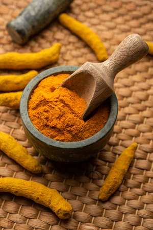 Dry Turmeric Dust or Haldi Powder also known as curcuma longa linn, selective focusの写真素材