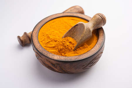 Dry Turmeric Dust or Haldi Powder also known as curcuma longa linn, selective focus