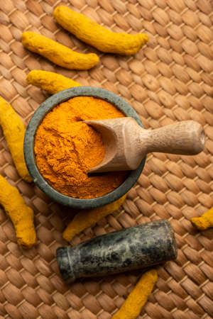 Dry Turmeric Dust or Haldi Powder also known as curcuma longa linn, selective focusの写真素材
