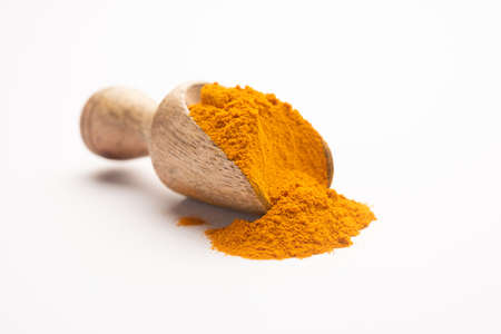 Dry Turmeric Dust or Haldi Powder also known as curcuma longa linn, selective focusの写真素材