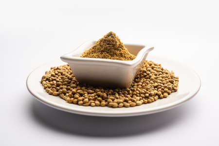 Indian spice Heap of Coriander powder or Dhaniya Powder or Chinese parsley dried seeds, selective focusの写真素材