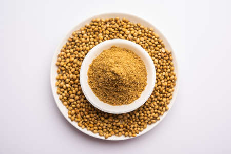 Indian spice Heap of Coriander powder or Dhaniya Powder or Chinese parsley dried seeds, selective focusの写真素材
