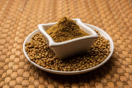 Indian spice Heap of Coriander powder or Dhaniya Powder or Chinese parsley dried seeds, selective focusの写真素材