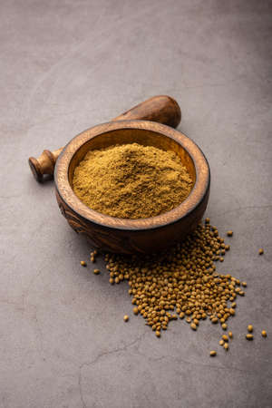 Indian spice Heap of Coriander powder or Dhaniya Powder or Chinese parsley dried seeds, selective focusの写真素材