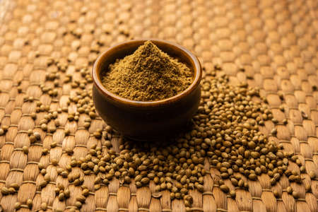 Indian spice Heap of Coriander powder or Dhaniya Powder or Chinese parsley dried seeds, selective focusの写真素材