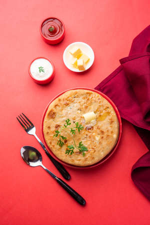 Aloo paratha or gobi paratha also known as Potato or Cauliflower stuffed flatbread dish originating from the Indian subcontinentの写真素材