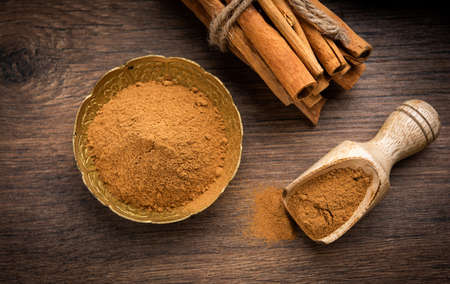 Cinnamon sticks and powder also known as Dalchini dust, Important ingradient from Indian spicesの写真素材