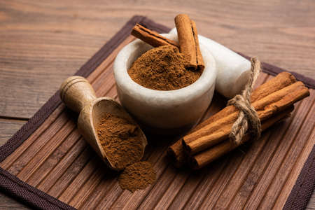 Cinnamon sticks and powder also known as Dalchini dust, Important ingradient from Indian spices