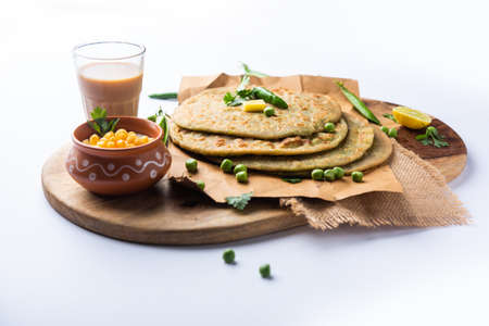 Green Peas paratha or flatbread or matar parathas with curd and hot tea