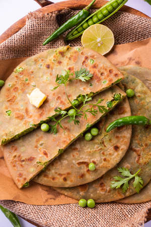 Green Peas paratha or flatbread or matar parathas with curd and hot tea