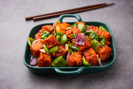 chilli paneer dry is made using cottage cheese, Indo chinese foodの写真素材