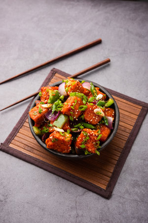 chilli paneer dry is made using cottage cheese, Indo chinese foodの写真素材
