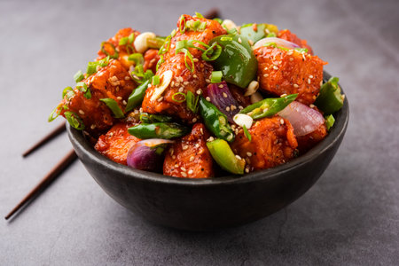 chilli paneer dry is made using cottage cheese, Indo chinese foodの写真素材