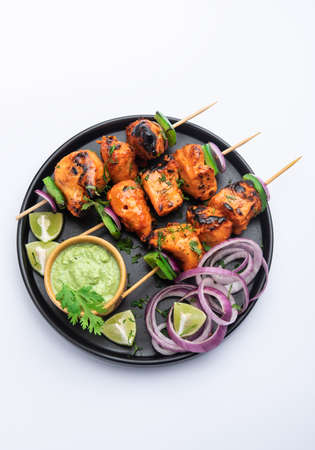 Indian chicken tikka kebabs, marinated in spices and yogurt and roasted in tandoori. served with...