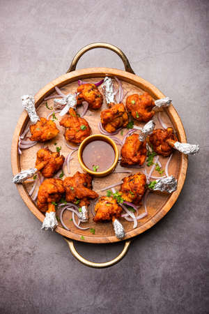Chicken lollipop is Indian Chinese appetizer which is a frenched chicken wingletの写真素材