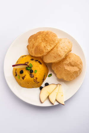 Halwa Puri or sheera poori is an Indian and Pakistani dessertの写真素材