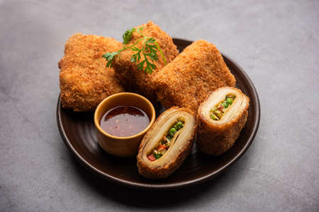 Box Patties, Delicious deep fried south Iasian pastry snack filled with something savory and Coated with Bread Crumbの写真素材