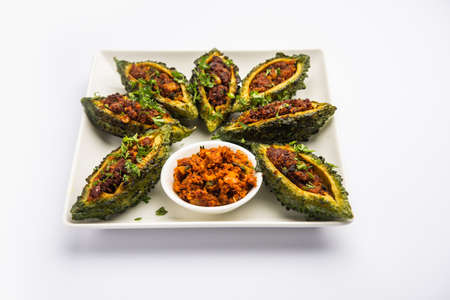 Bharwa karela masala fry or stuffed bitter melon recipeの写真素材