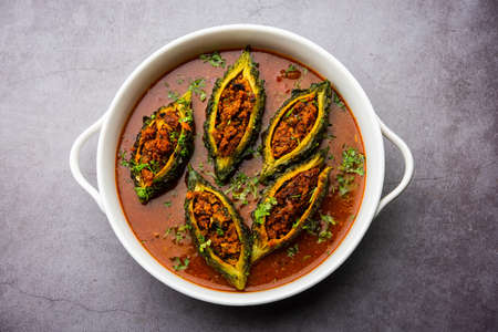 Bharwa Karela masala or stuffed bitter melon curry recipe